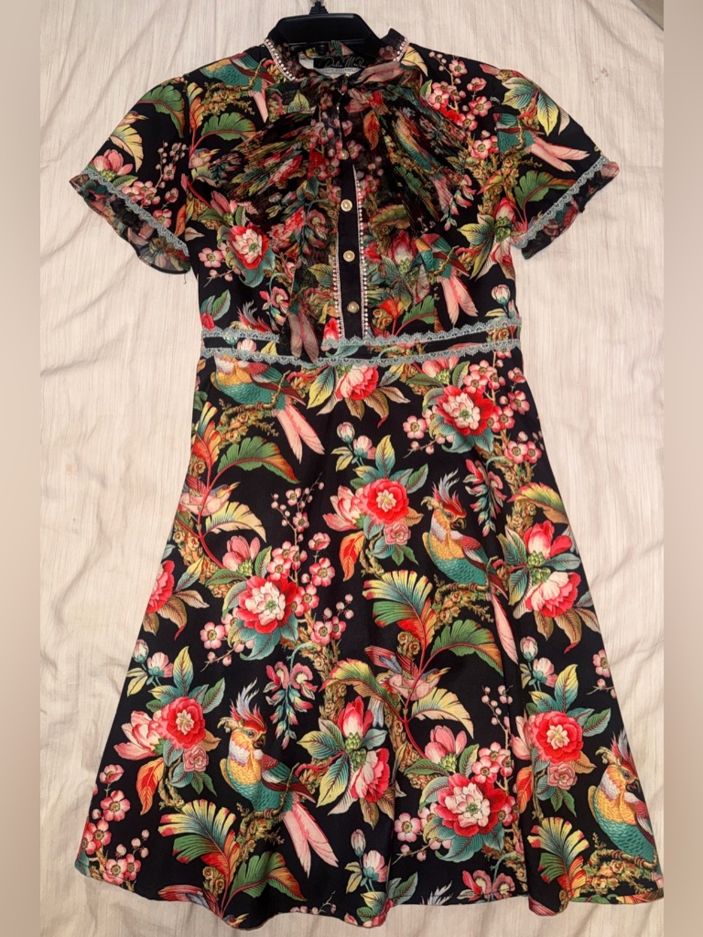 Dalia MacPhee short sleeve tie neck satin tropical mini dress with lace trim